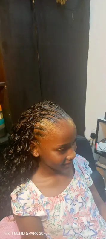 Front cornrow braids flowing into long curls, supplied by NBD