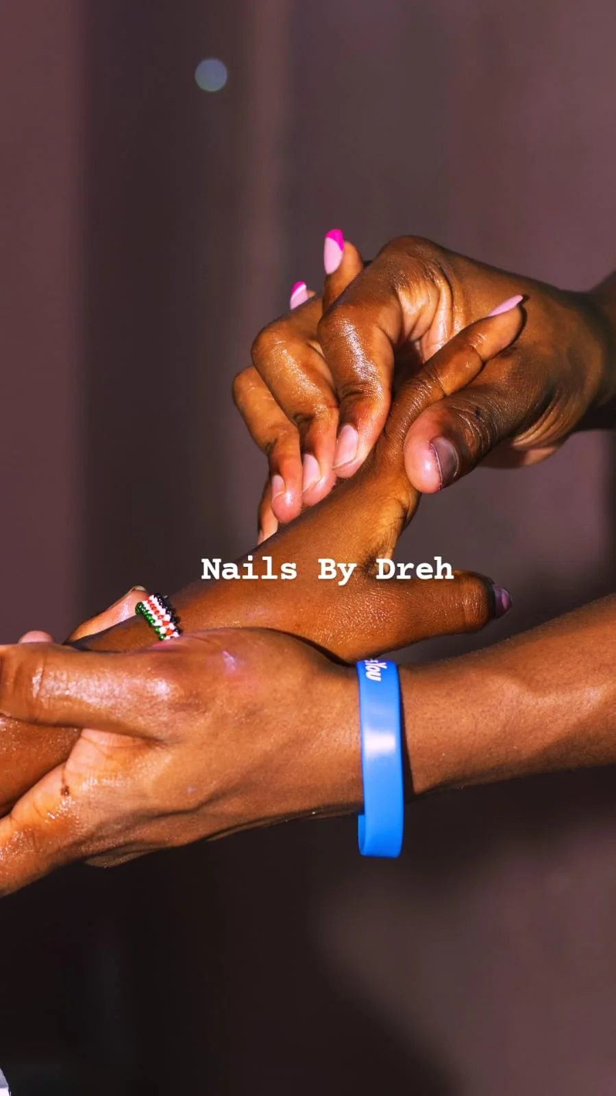 Hands receiving care, photographed for Nails By Dreh