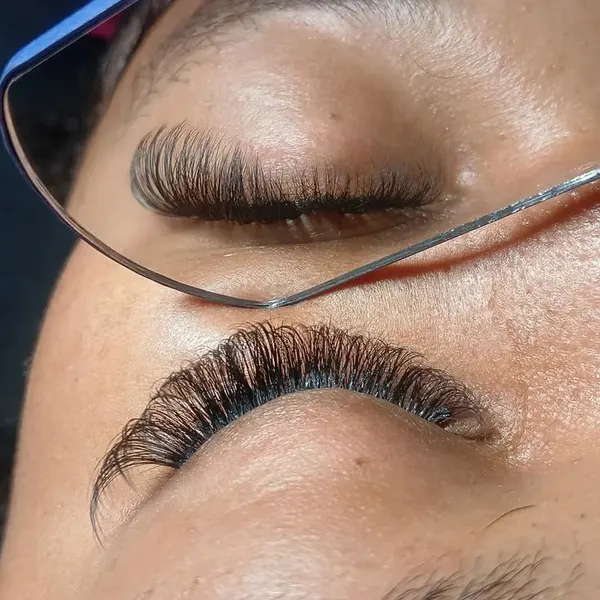 Lash extensions shown close up with a mirror reflection, supplied by NBD